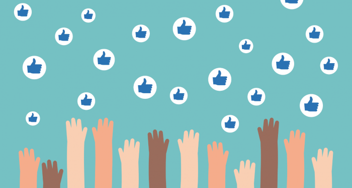 Hands reaching for Facebook likes