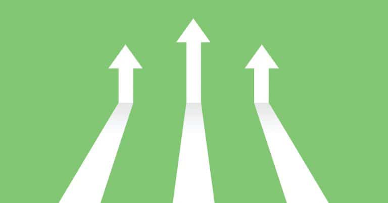 Vector illustration image of white arrows on green background coming in and pointing up to depict increasing trends. Specifically, indicating the topic of the blog post which is digital trends in 2023.